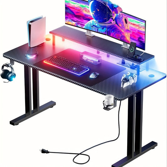 HLFurniNova RGB LED Gaming Desk with Power Outlets And Monitor Stand, Ergonomic Computer Gaming Workstation, Large Carbon Fibre Tabletop Home Office Desk with Cup Holder And Headphone Hook, Black, Gaming Room Accessories, Gaming Room Decor, Workstation Setup, Modern Workstation, Stylish Gaming Table, Premium Workstation, Solid Wood Desk, Streamers, Pc Gamers