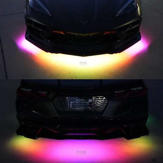 a black sports car with a customized rear bumper and a set of LED lights that are turned on, creating a colorful glow around the vehicle.